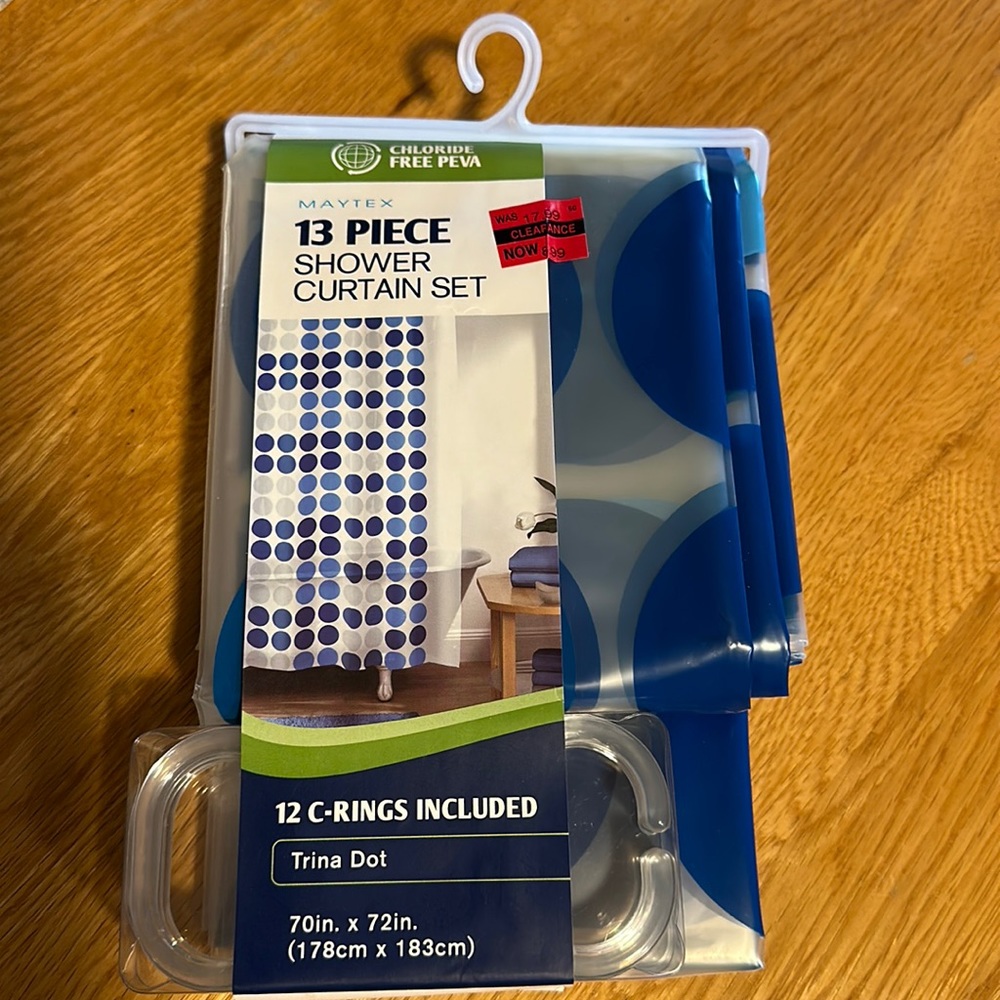 Rand new shower curtain with rings, clear with blue dots